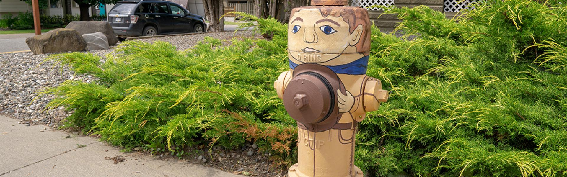 Painted fire hydrant character on the self-guided walking tour