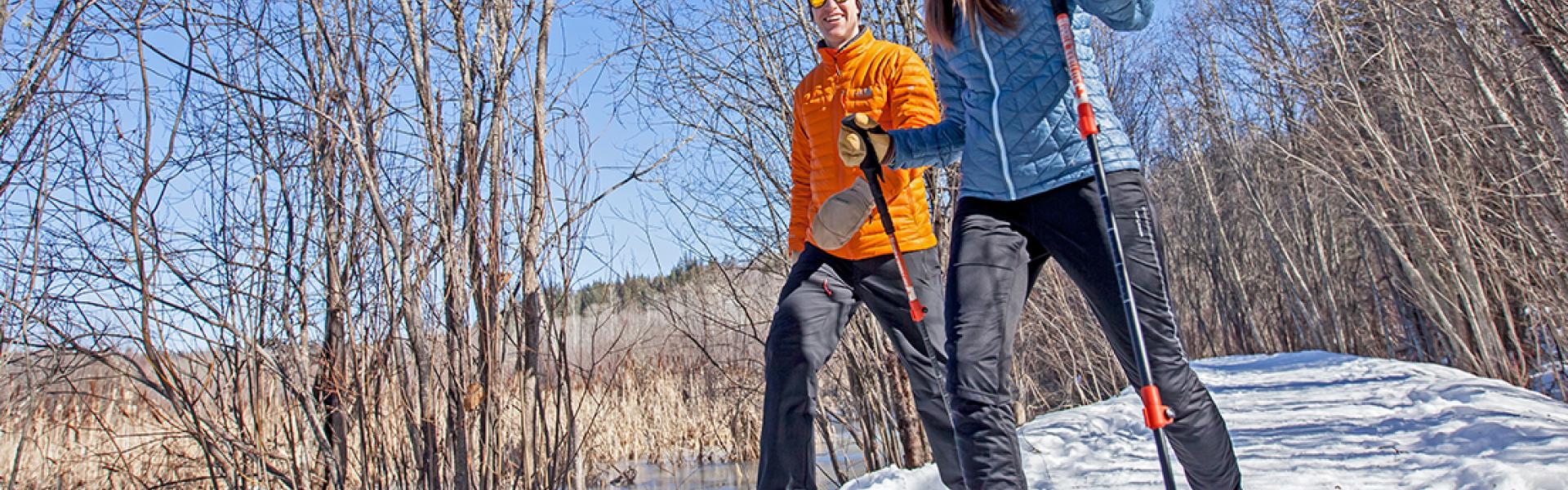 A couple snowshoeing at West Fraser Timber Park