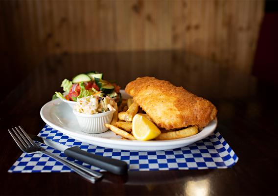 Fish & chips with coleslaw & Caesar salad